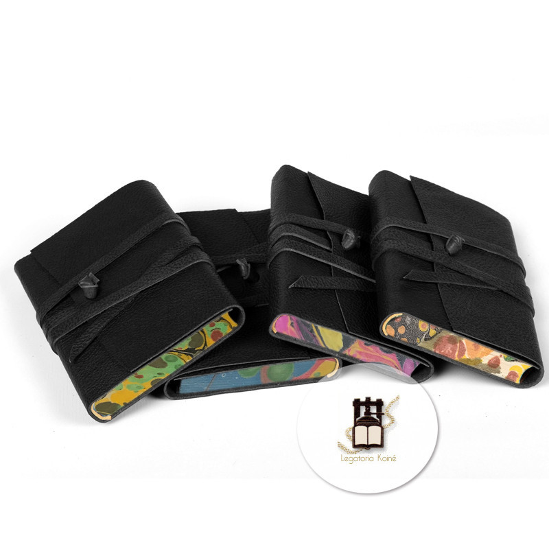 Amazing old-style leather wrap journals with hand colored paper boards