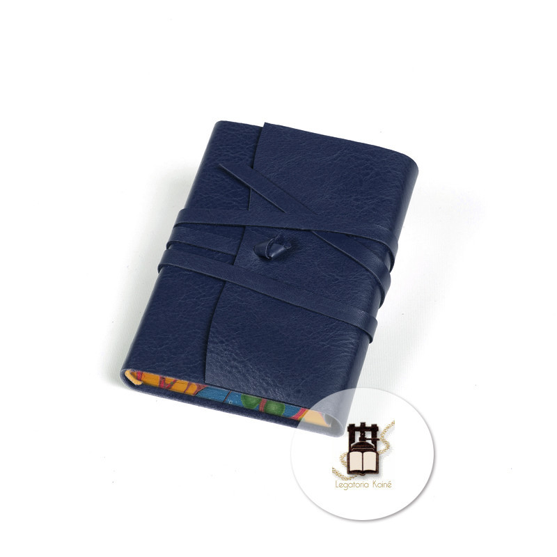 Carnets vintage relié cuir avec bord papier marbré. Très beaux!