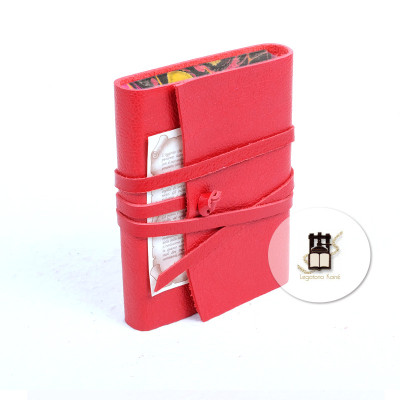 Carnets vintage relié cuir avec bord papier marbré. Très beaux!